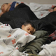 Detainees sleep in a holding cell at a U.S. Customs and Border Protection processing facility on June 18, 2014, in Brownsville,Texas. Brownsville and Nogales, Ariz., have been central to processing the more than 47,000 unaccompanied children who have entered the country illegally since Oct. 1.
Eric Gay-Pool/Getty Images